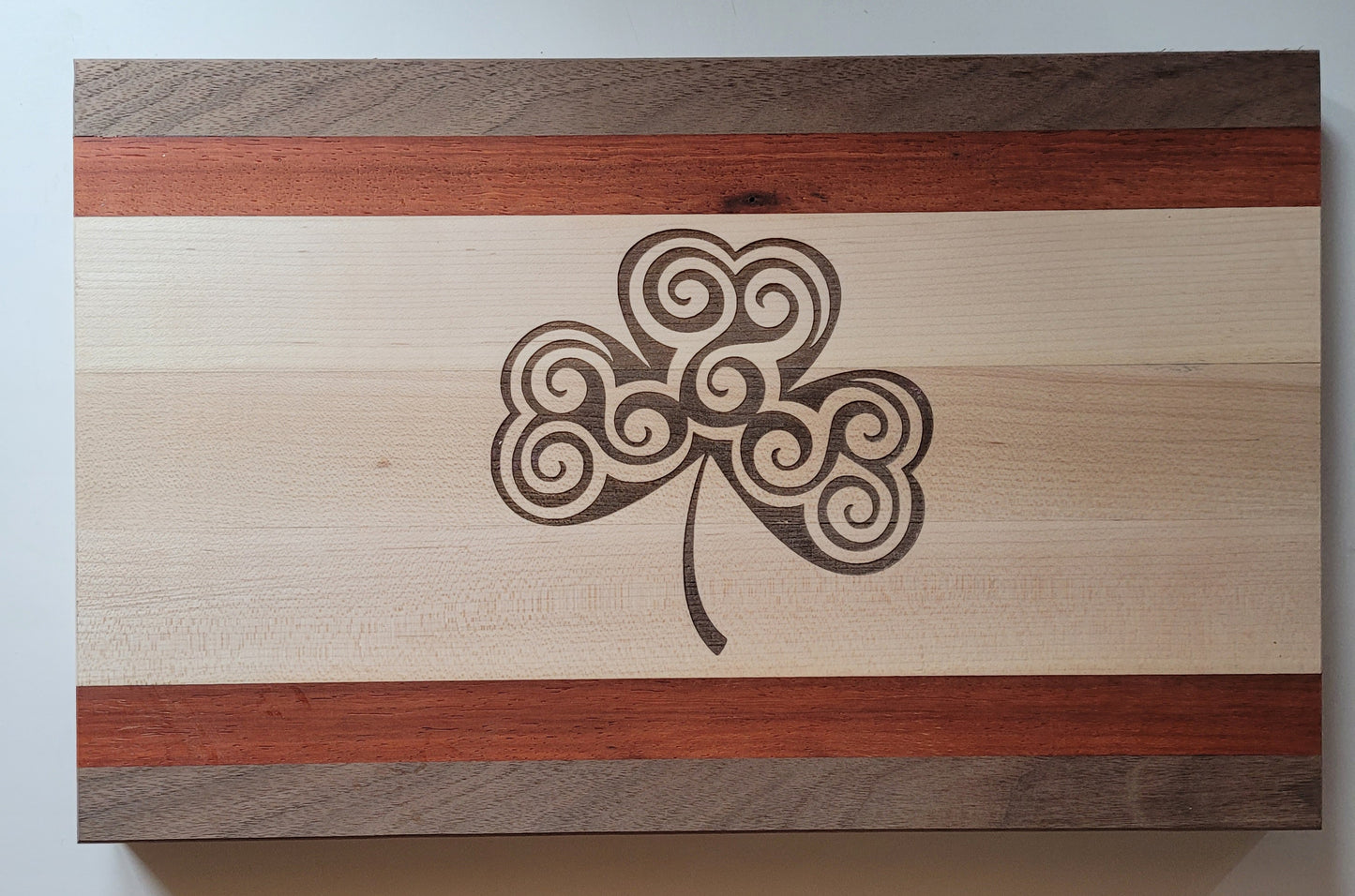 Walnut, Maple and Paduak edge grain.
